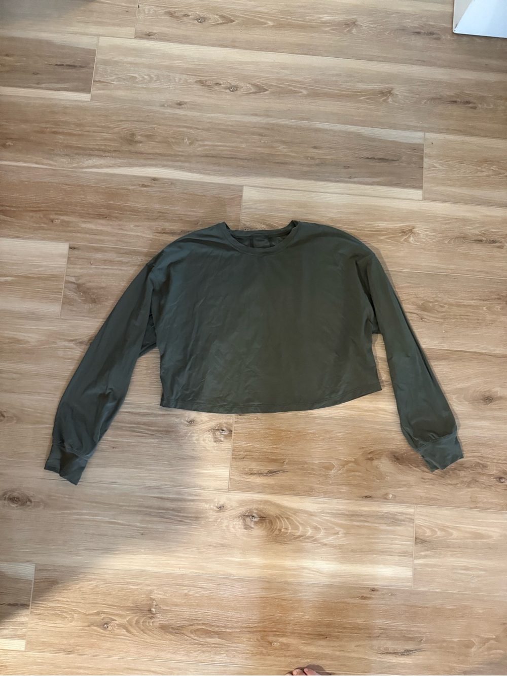 Olive green Lululemon top. Slight bell sleeve and crop. Butter soft.